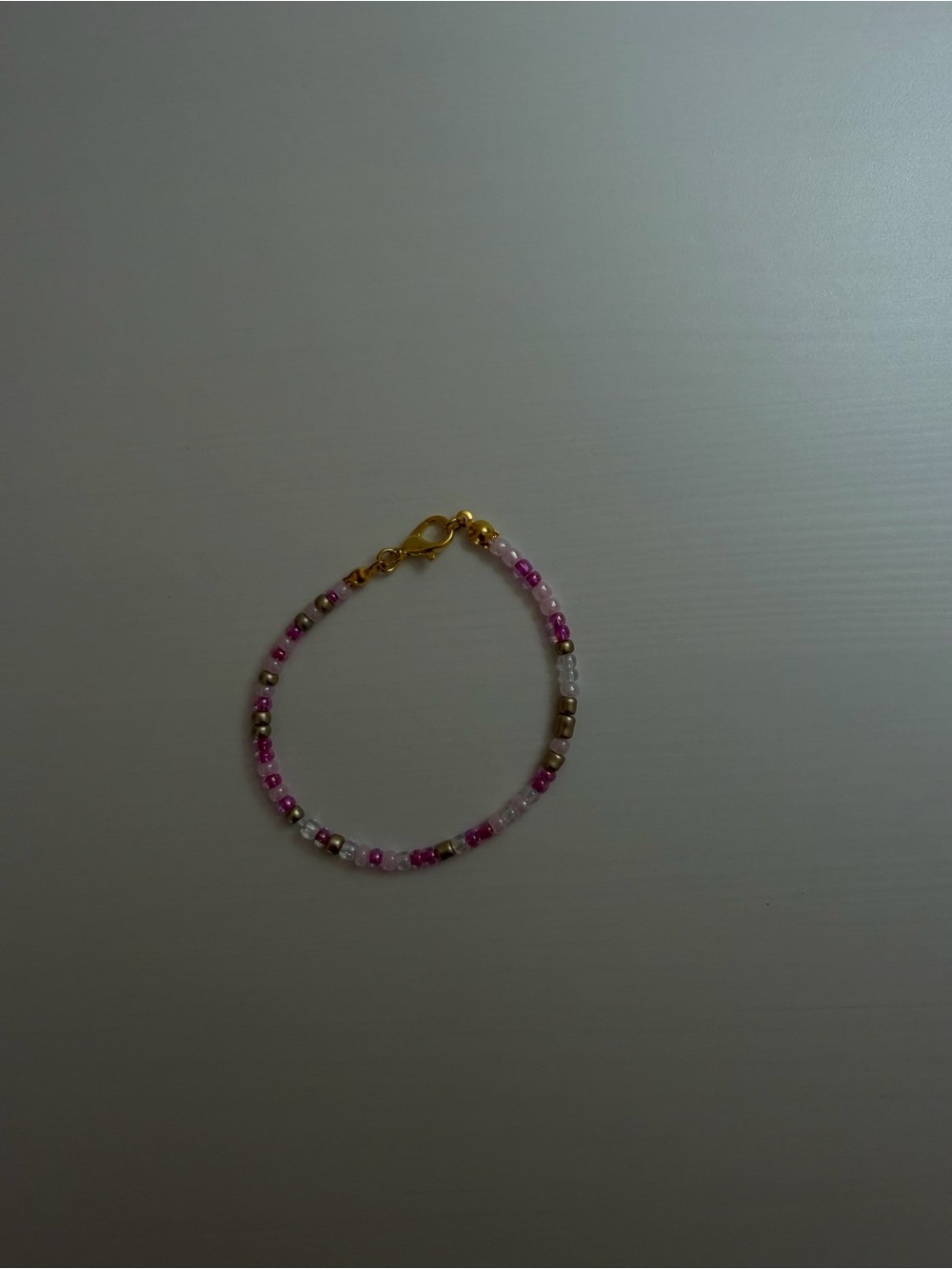 Delicate Pink Beaded Bracelet with Gold Accent